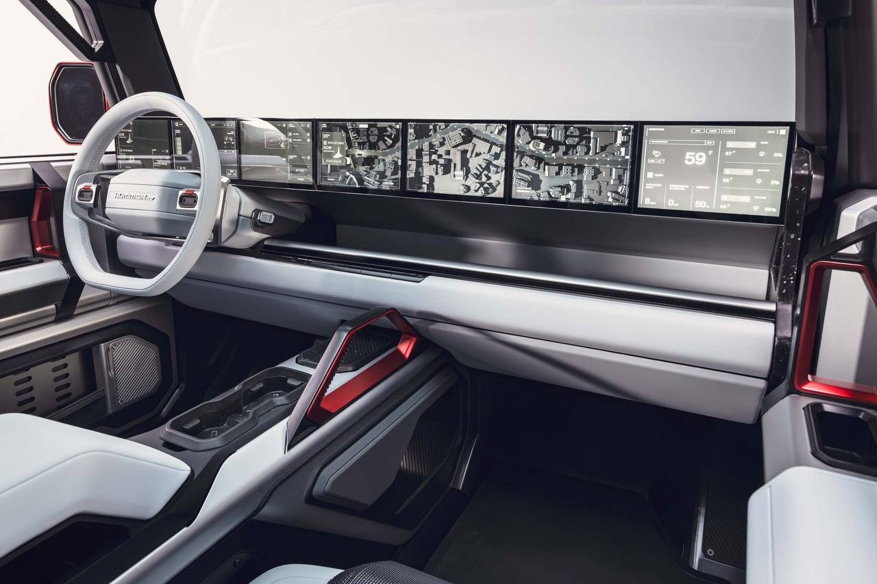Модульный электрический внедорожник GMC Hummer X на бездорожье с высоким клиренсом и съёмными кузовными элементами